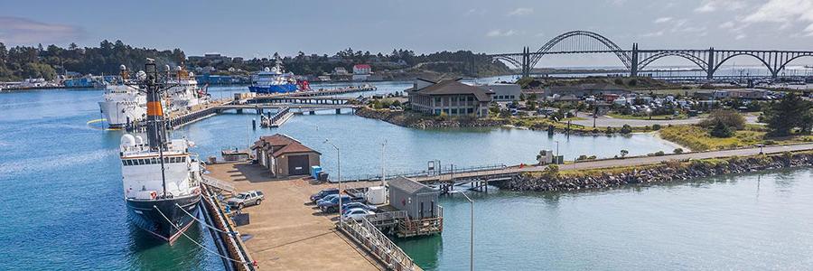 view of Newport Harbor that includes HMSC and a bridge